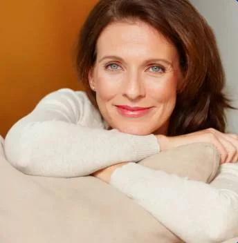 Female customer testimonial image for SynoGut digestive